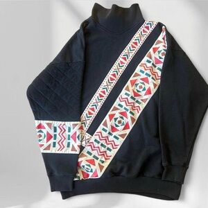 Black Turtleneck Sweater with Geometric Accent